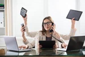 Multitasking Businesswoman In Office